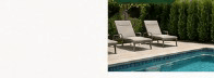Spartan Juniper privacy screen along a backyard pool and patio